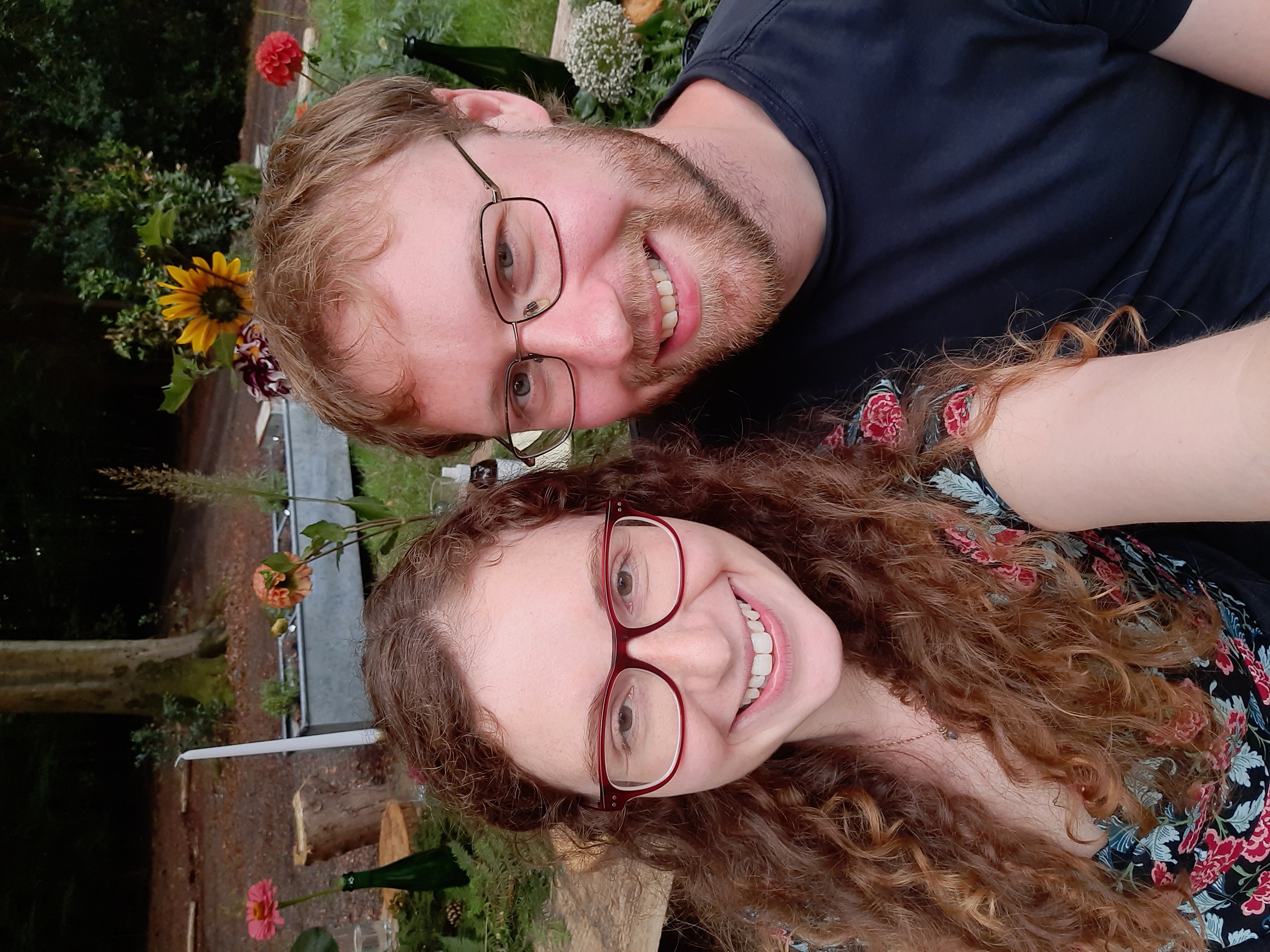 Katelyn and Geoff with flowers